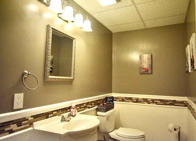 334 Belaire Dr, Copperhill, TN 37317 - half bath with a paneled ceiling, toilet, a wainscoted wall, and vanity