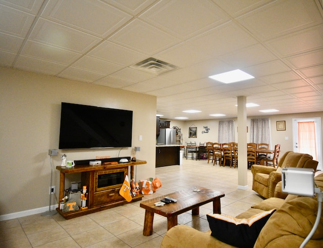 living room with light tile patterned floors