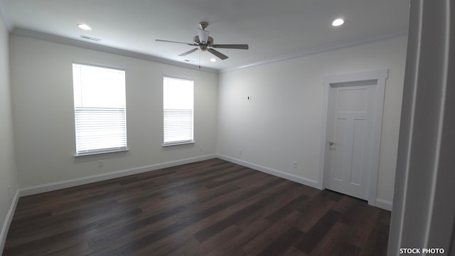 empty room with dark wood-type flooring, ceiling fan, and crown molding