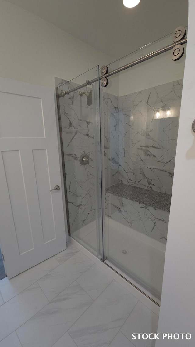 bathroom featuring walk in shower