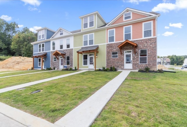 view of front of house featuring a front lawn