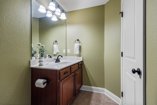 bathroom featuring vanity and tile patterned flooring