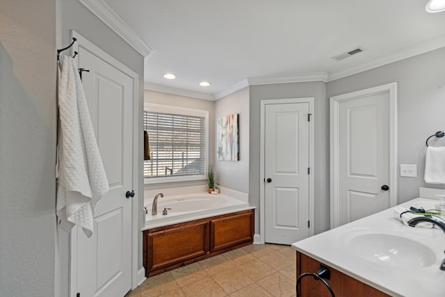 bathroom featuring a washtub, vanity, tile patterned floors, and ornamental molding