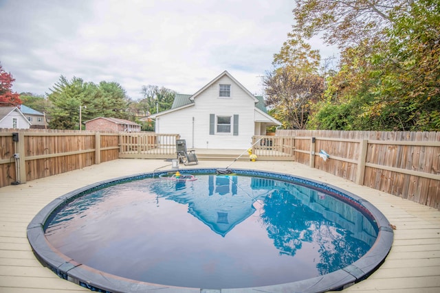 view of pool with a deck