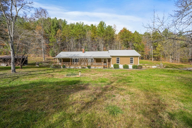 view of front of house featuring a front lawn and a porch