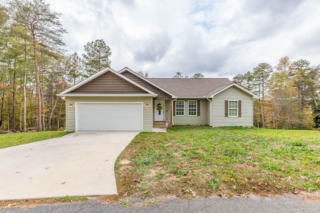 view of front facade featuring a garage and a front yard