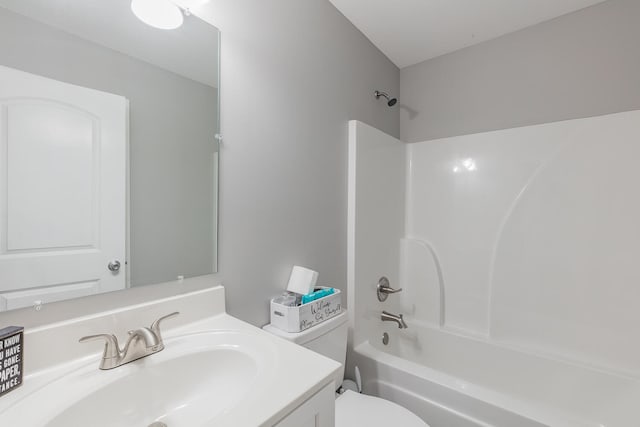 full bathroom with toilet, washtub / shower combination, and vanity