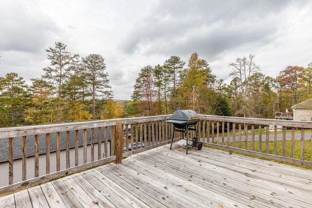 wooden deck with area for grilling