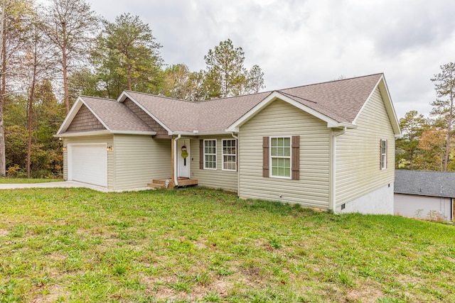 ranch-style house with a garage and a front yard