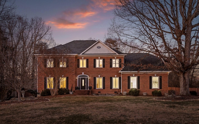 colonial house with a lawn