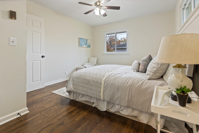 bedroom featuring ceiling fan and dark hardwood / wood-style floors