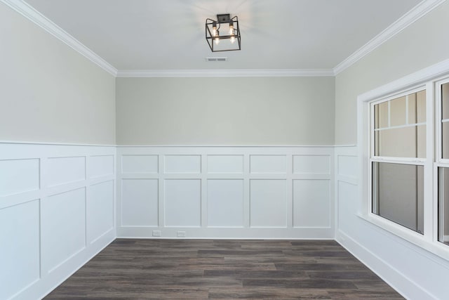 unfurnished dining area with dark hardwood / wood-style floors, crown molding, and a notable chandelier