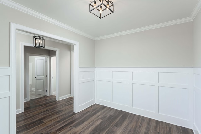 interior space featuring a chandelier, dark hardwood / wood-style floors, and crown molding