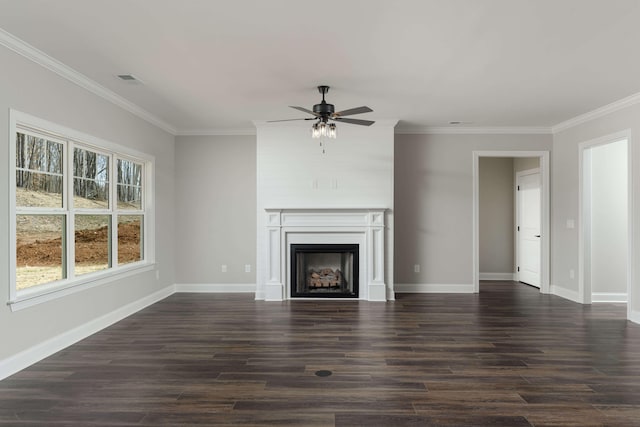 unfurnished living room with a fireplace, dark hardwood / wood-style floors, and ornamental molding