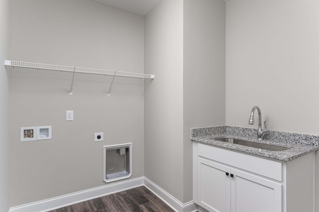 laundry room featuring hookup for an electric dryer, dark hardwood / wood-style flooring, cabinets, sink, and washer hookup