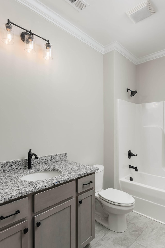 full bathroom featuring  shower combination, vanity, toilet, and crown molding