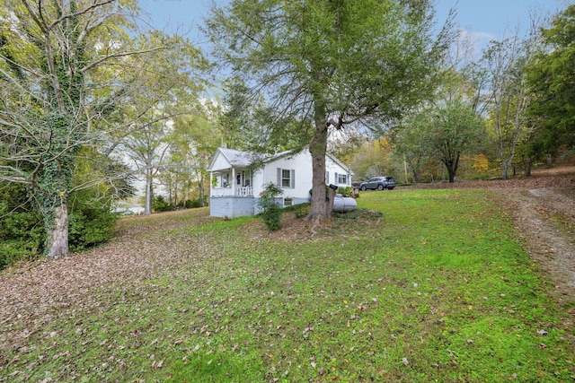 view of yard featuring a porch