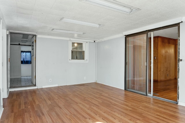 spare room featuring hardwood / wood-style flooring