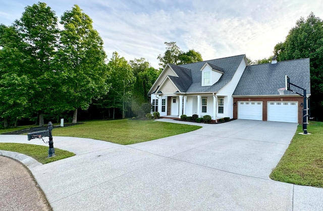 cape cod house featuring a front lawn, covered porch, and a garage