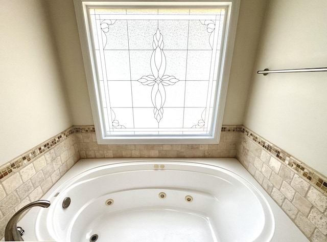 bathroom featuring a washtub