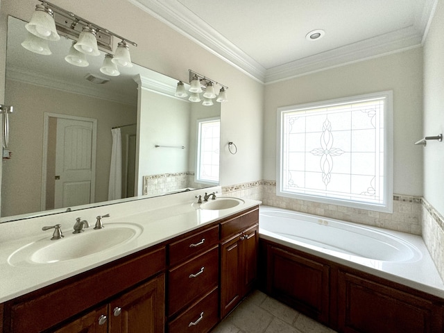 bathroom with a bath, vanity, tile patterned floors, and ornamental molding