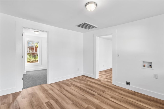 empty room with light wood-type flooring