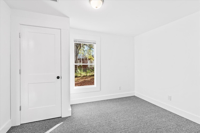 view of carpeted spare room