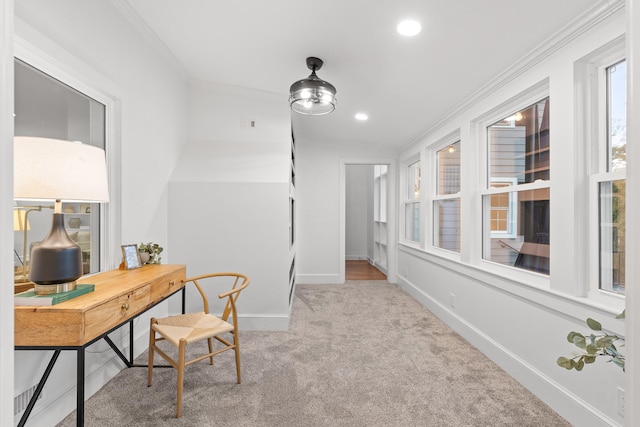 office featuring lofted ceiling, light carpet, and crown molding