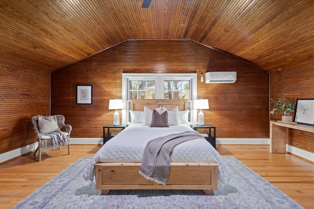 bedroom featuring light wood-type flooring, lofted ceiling, wooden walls, and wooden ceiling