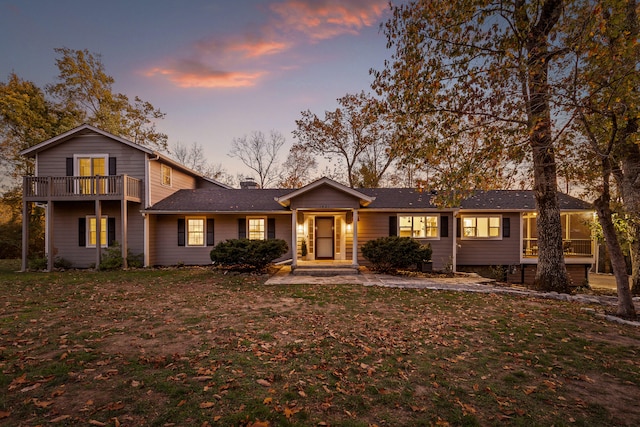 view of front of home with a lawn