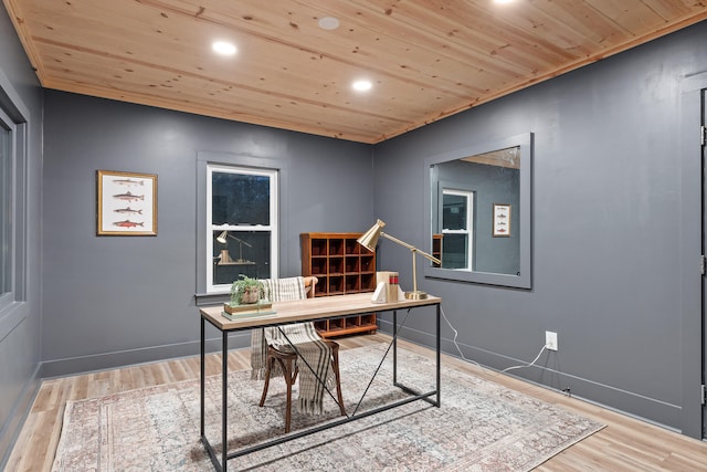 office with wooden ceiling and hardwood / wood-style flooring