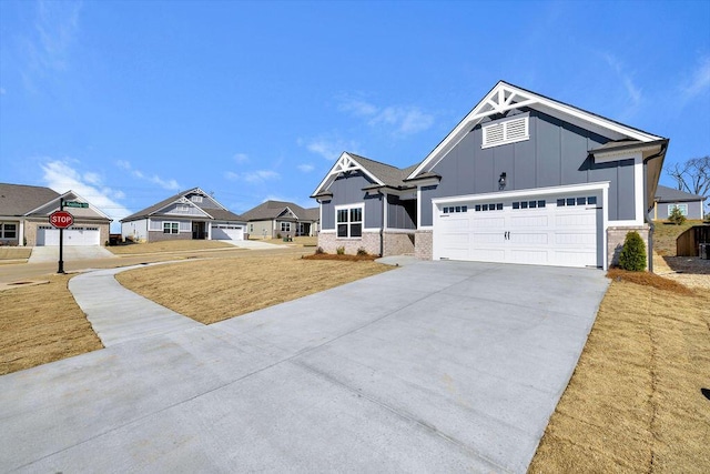 view of front of property with a garage and a front yard