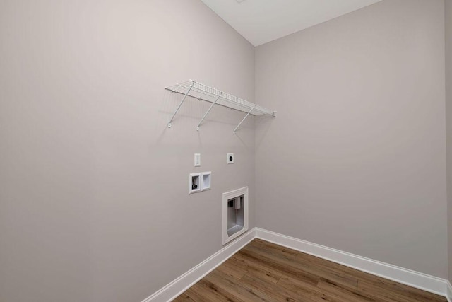 laundry area featuring hardwood / wood-style flooring, washer hookup, and hookup for an electric dryer