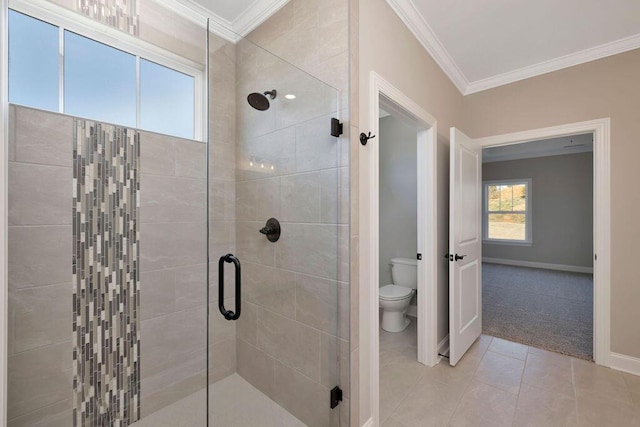 bathroom with tile patterned flooring, a shower with shower door, ornamental molding, and toilet