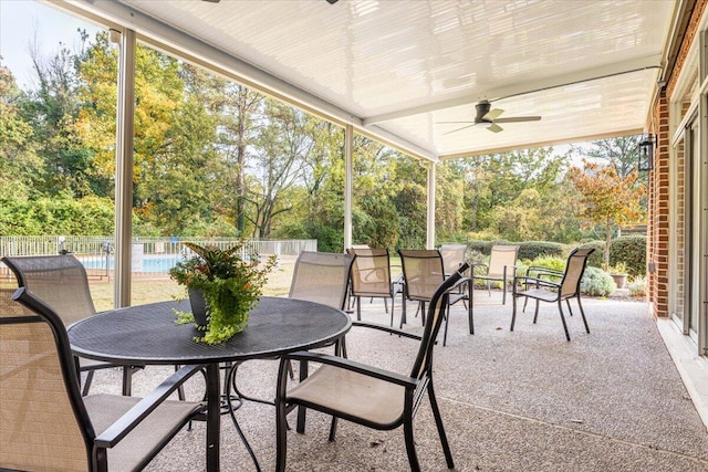 view of patio featuring ceiling fan