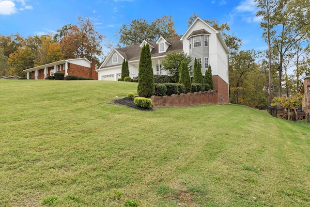 exterior space with a front lawn and a garage