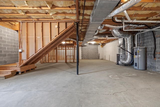 basement with heating unit and electric water heater