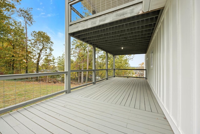 deck featuring a lawn