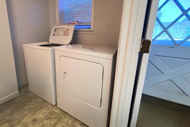 laundry room with laundry area and washing machine and clothes dryer