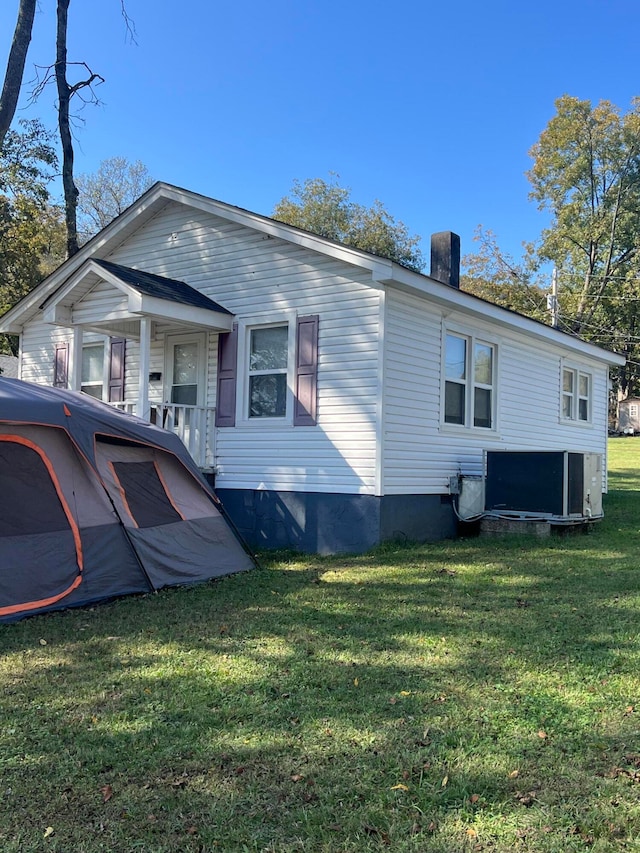 exterior space with a lawn