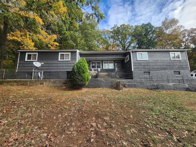 back of house featuring crawl space