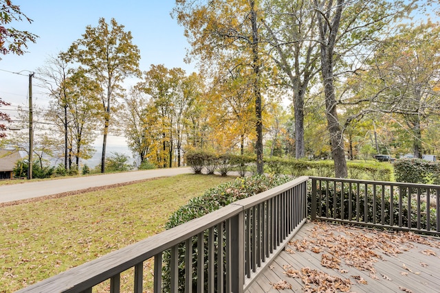 deck featuring a lawn