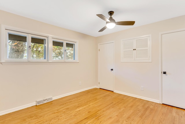 unfurnished bedroom featuring ceiling fan and light hardwood / wood-style floors