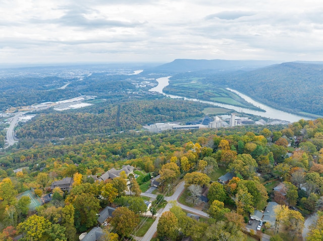 drone / aerial view with a water and mountain view