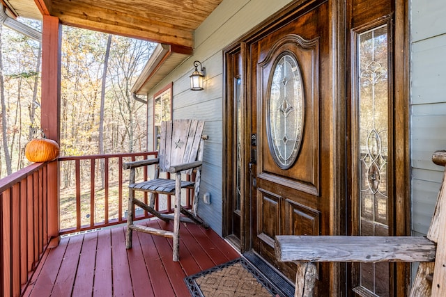 doorway to property with covered porch