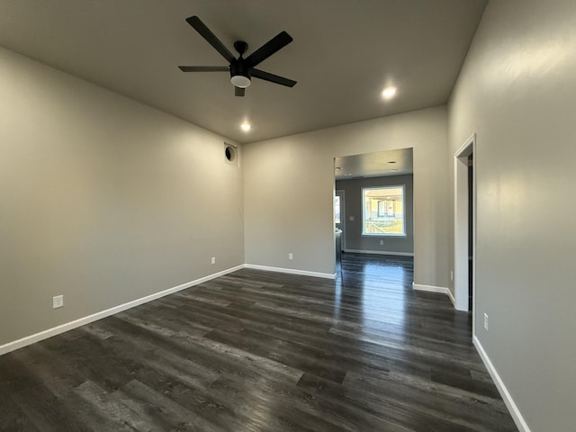 unfurnished room with dark wood-type flooring, recessed lighting, baseboards, and a ceiling fan