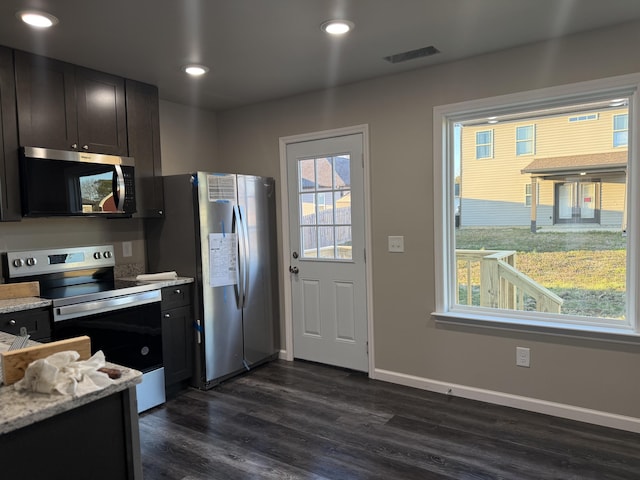 kitchen featuring baseboards, visible vents, appliances with stainless steel finishes, dark wood-style flooring, and recessed lighting