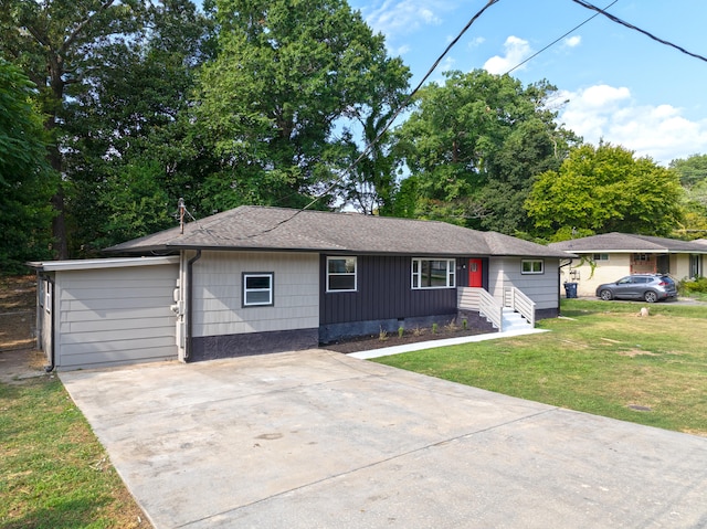 single story home with a front lawn