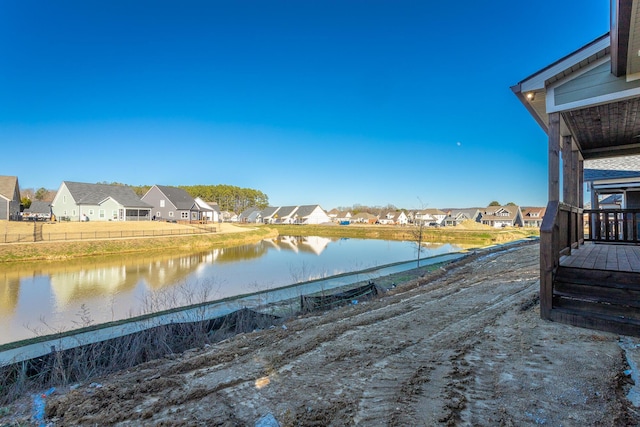 exterior space with a water view