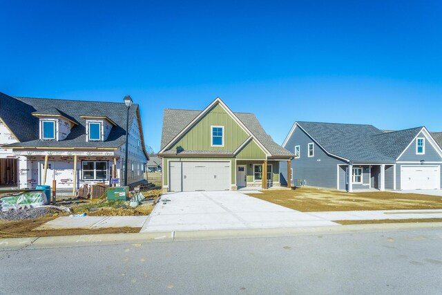 view of front of home featuring a garage and covered porch